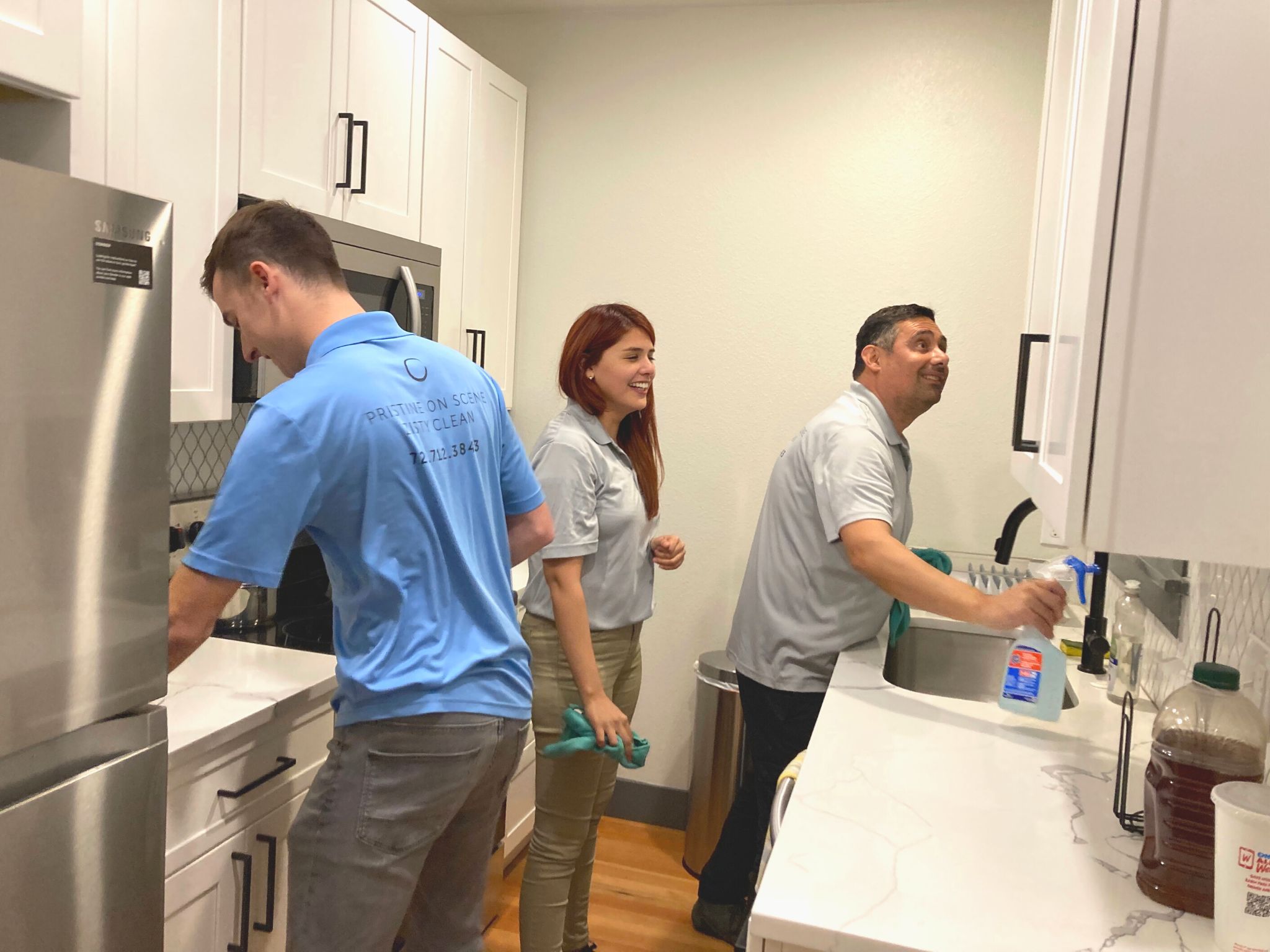 team-cleaning-in-kitchen